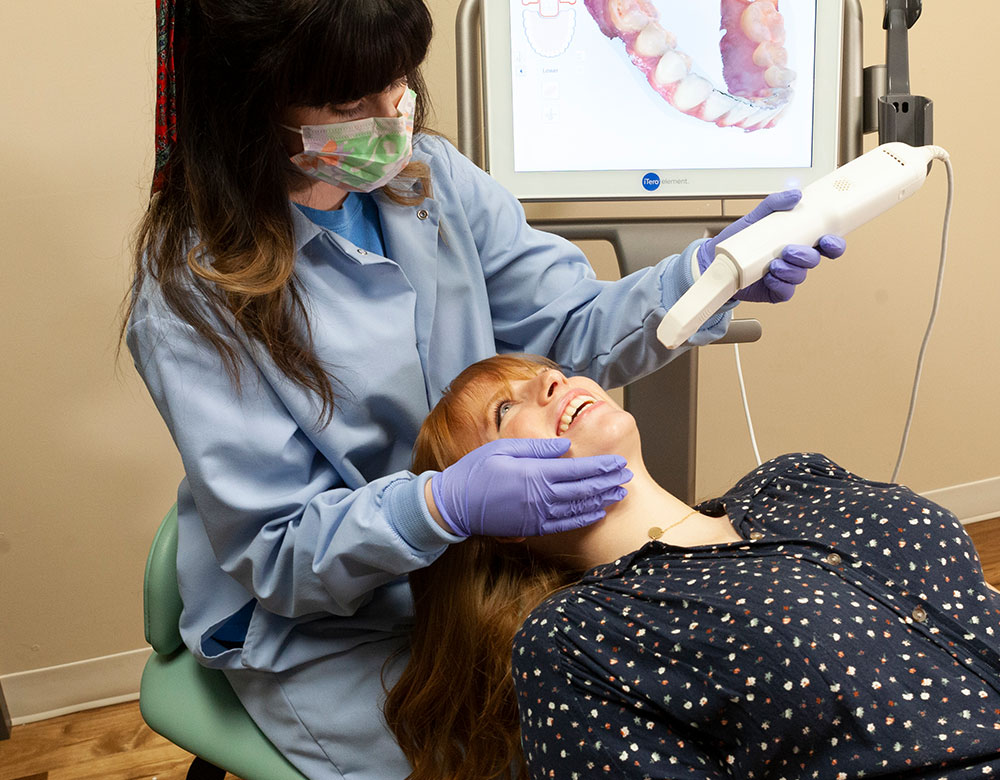 patient getting 3D scan of her mouth